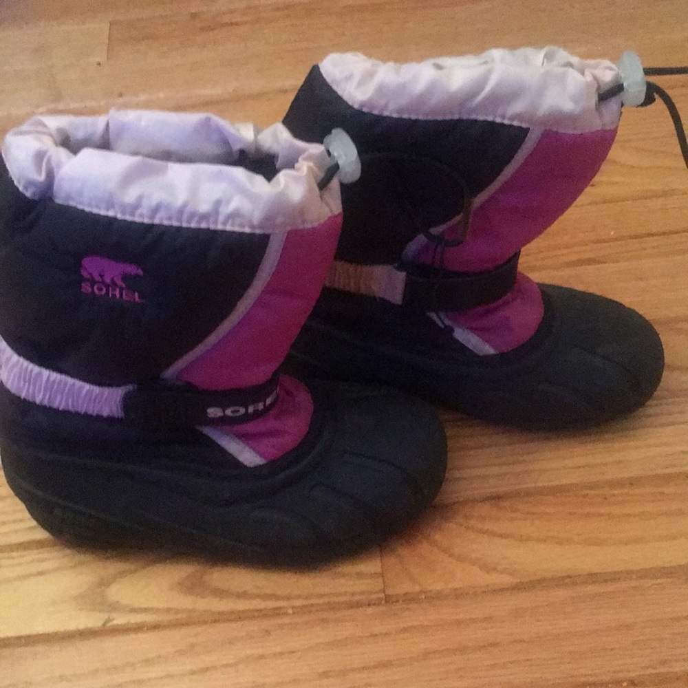 Pink and black snow boots